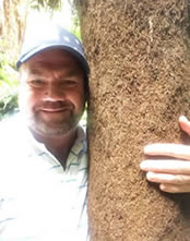 Gardening goose bumps hugging a Tree Fern