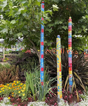 Our famous circle garden with Wayne’s friendship poles